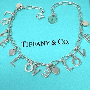 Authentic Tiffany & co. Love Notes Charm Bracelet.